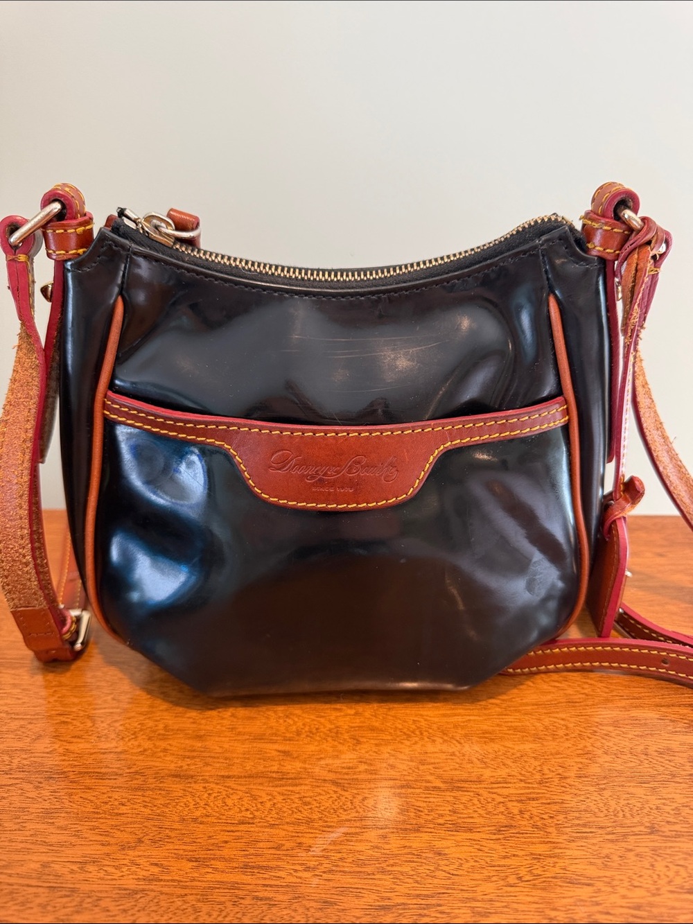 Dooney & Bourke Mini Margot Black Patent Crossbody with Brown Trim
